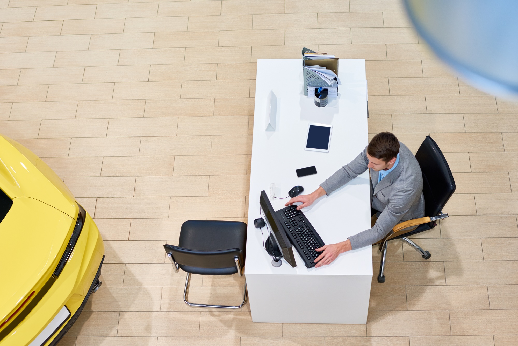 Sales Manager in Car Showroom